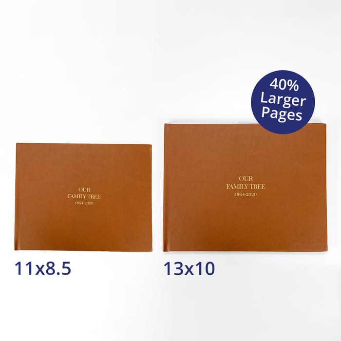 Two tan vegan leather Family History Books are placed side by side to show the size difference between the 11x8.5 inch book and the 40 percent larger 13x10 inch version.