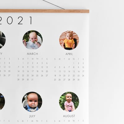 A close up showing the circular baby photos above each month on a 3x4 foot Engineer Print Calendar. A close up showing the circular baby photos above each month on a 3x4 foot Engineer Print Calendar.