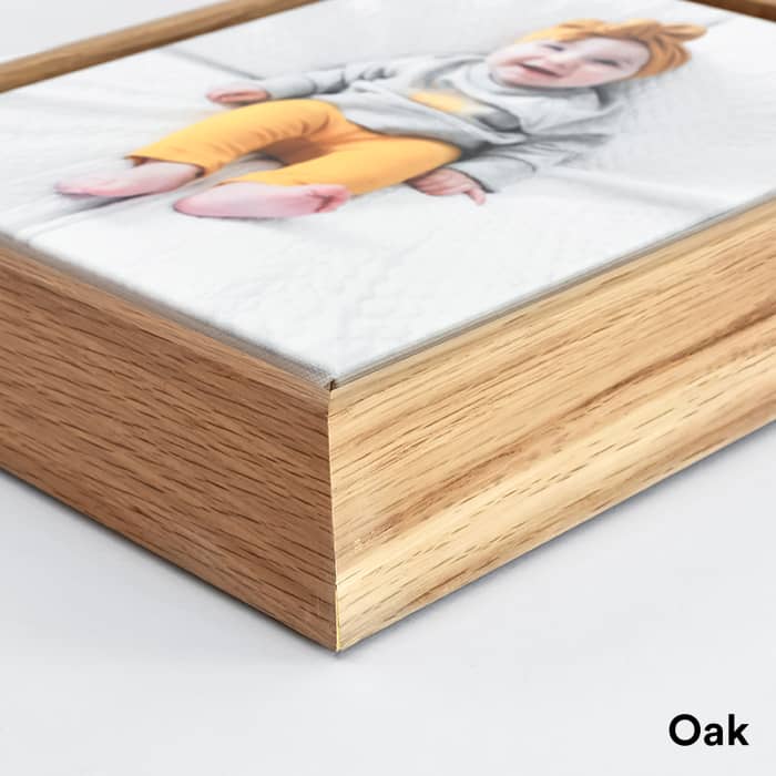 A closeup of the corner of an Oak frame shows the 2 inch depth.