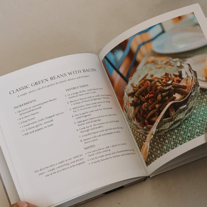 A MyCanvas Hardcover Photo Book lies open to a recipe page for Classic Green Beans with Bacon, with a photo of the finished dish in a glass bowl.