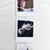 A closeup of a puppy photo hanging on a Parabo Press Photo Rope.