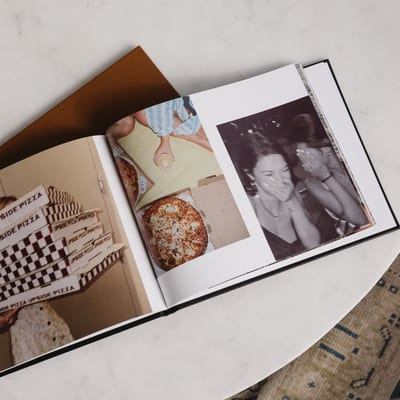 An open Premium Hardcover photo book An open Premium Hardcover photo book